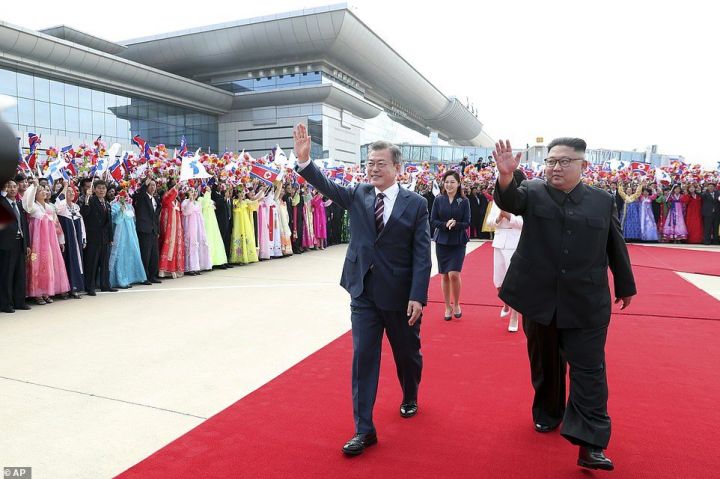 4355636-6178849-South_Korean_President_Moon_Jae_in_and_North_Korean_leader_Kim_J-a-56_1537272667209-e1551589575916.jpg