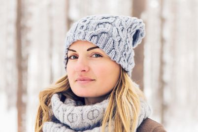 closeup-of-young-woman-in-wintertime-outdoor-snow-PLXBHSE.jpg