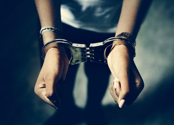 prisoner-with-handcuffs-on-hands.jpg