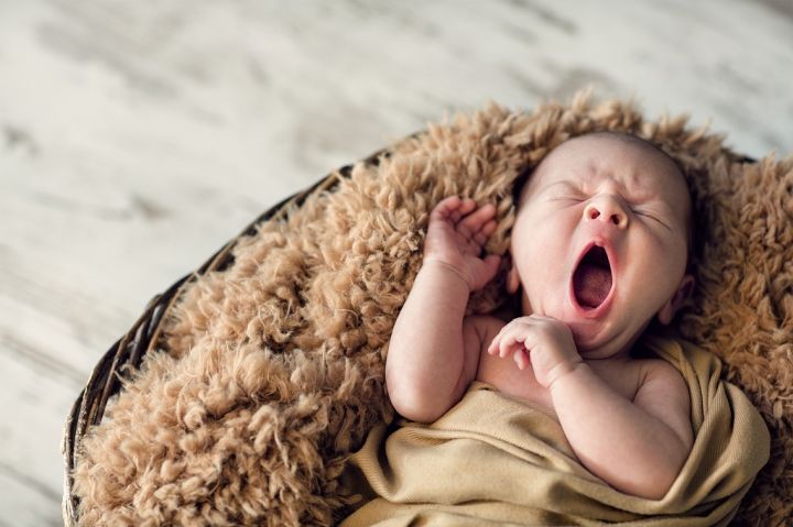 sweet-newborn-baby-yawns-PDLLNCM.jpg